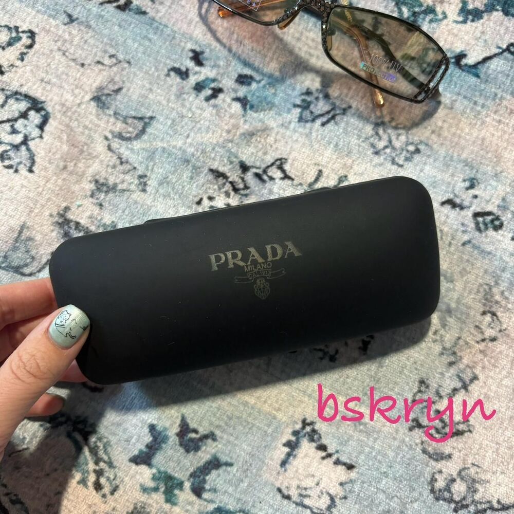 Prada Women's Black and Cream Sunglasses